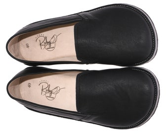 Zapatos minimalistas de cuero negro hechos a mano, punta ancha, caída cero.