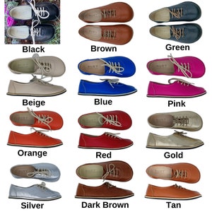 May include: A set of 12 pairs of women's leather shoes in various colours, including black, brown, green, beige, blue, pink, orange, red, gold, silver, dark brown, and tan. Each pair features a lace-up design and the brand name "RUBY" is visible on the shoes.