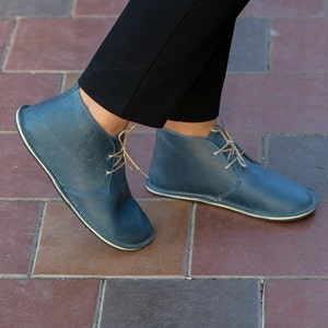 Blue barefoot ankle lace up boots