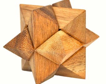 May include: A wooden burr puzzle with a star-like shape. The puzzle is constructed from multiple interlocking wooden pieces, showcasing the natural grain and color variations of the wood. The pieces are precisely cut and assembled to form a complex, three-dimensional structure.