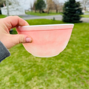 Vintage Pink 402 1/3 quart Pyrex Bowl with fading and color damage/