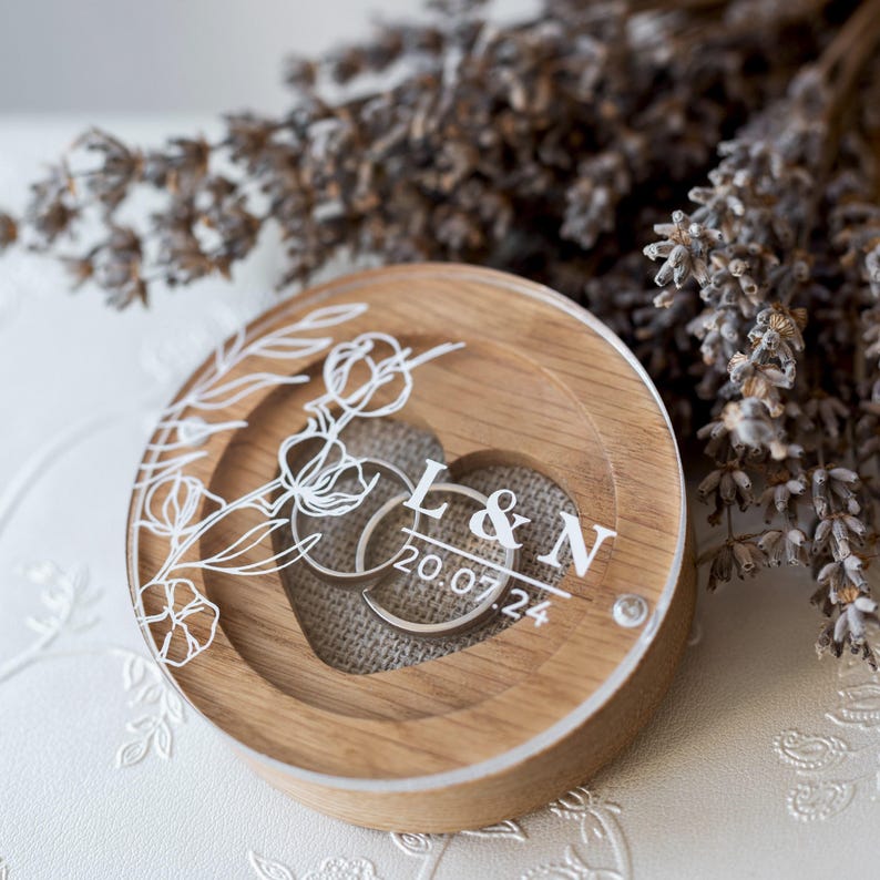 Personalized rustic oak ring box with acrylic lid and linen pillow for engagement.