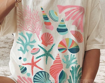 Camiseta con estampado de conchas marinas, colores cómodos, estilo vintage, con estética campestre, camiseta náutica, pareo de traje de baño, camiseta de surf costera extragrande.