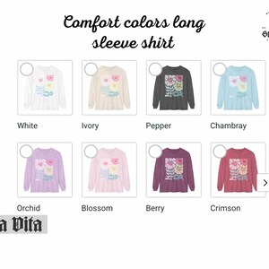 May include: A long-sleeved shirt with a floral print in ten different colours. The colours are white, ivory, pepper, Chambray, orchid, blossom, berry, crimson, and two shades of pink. The shirt is available in sizes S-XL.