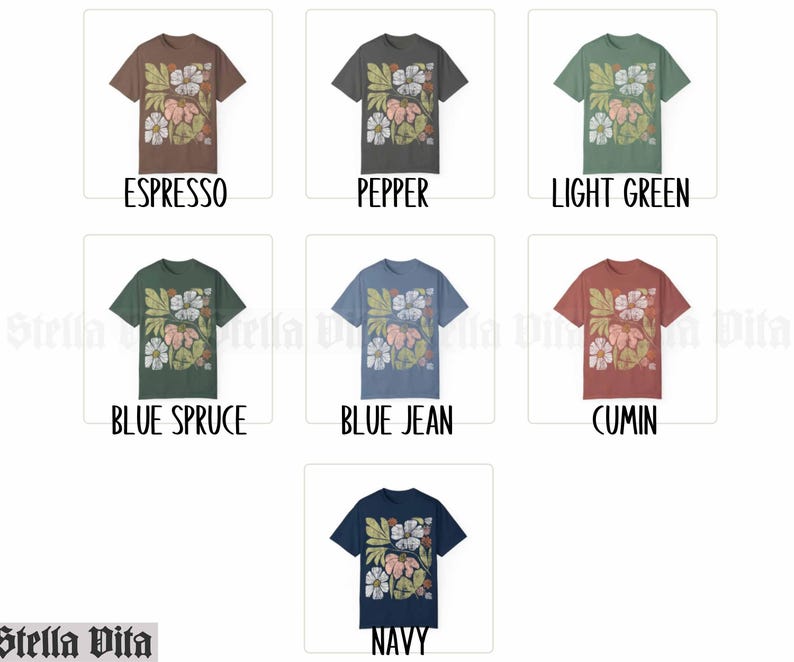 May include: A collection of t-shirts featuring a floral design in various colors, including espresso, pepper, light green, blue spruce, blue jean, cumin, and navy.