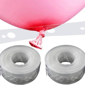 May include: Two rolls of clear balloon arch tape with holes for attaching balloons. The tape is designed to create a balloon arch or garland. A pink balloon is shown being attached to the tape.