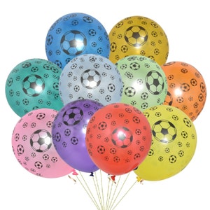 May include: A bunch of colorful balloons with a soccer ball pattern. The balloons are in shades of blue, green, yellow, orange, red, and purple.