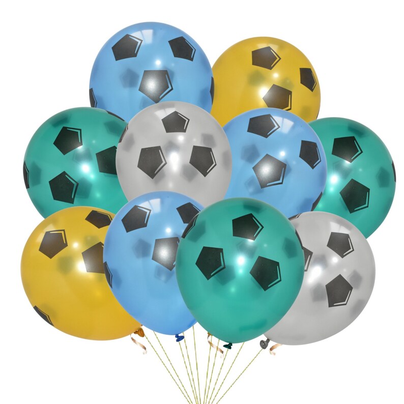 May include: A group of nine soccer-themed balloons in various colors, including silver, gold, blue, and green. Each balloon features a black soccer ball design.
