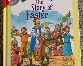 May include: A children's book titled "The Story of Easter" with a colorful illustration of Jesus riding a donkey. The book includes a DVD.