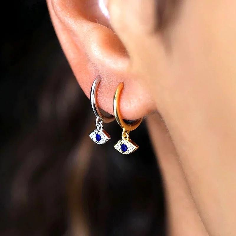 Evil eye huggie earrings best sale