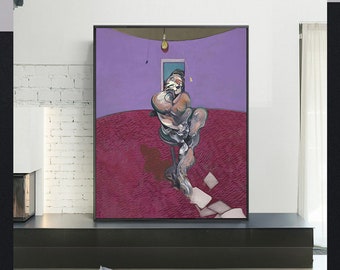 May include: A framed abstract painting with a figure in shades of brown and gray against a purple background. The figure appears to be seated on a red textured surface. A small window and a light bulb are visible.