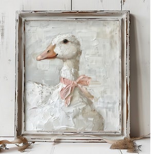 May include: An oil painting on canvas featuring a white goose with a soft pink ribbon tied around its neck. The artwork uses thick, textured brushstrokes and is housed in a distressed white wooden frame with visible paint chips and wear.