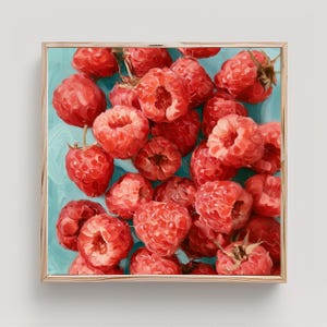 May include: A square wall art print featuring a vibrant oil painting of numerous ripe red raspberries clustered together against a textured light blue background. The brushstrokes are visible, creating a tactile effect on the fruit surface.