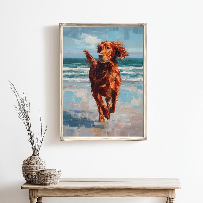 May include: A framed painting depicts a red-haired dog running on a beach. The dog is in mid-stride, with its ears and fur flowing in the wind. The background shows the ocean and a cloudy sky, painted with broad brushstrokes.