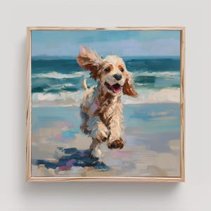 May include: A framed painting depicting a light brown Cocker Spaniel running on a beach. The dog's ears are blowing in the wind, and its mouth is open. The background shows the sea and sky in shades of blue.