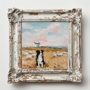 May include: An oil painting in a distressed white ornate frame depicting a black and white border collie sitting in a golden field with sheep. In the background, a small white cottage sits under a pale blue and pink sky with visible brushstrokes.