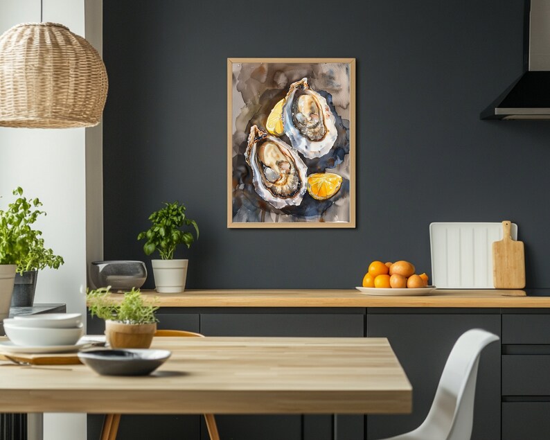 May include: Watercolor painting of two opened oysters with lemon wedges on a dark background. The artwork is framed in a light wood frame and hangs on a dark gray wall. The painting is a still life, depicting the oysters in detail.