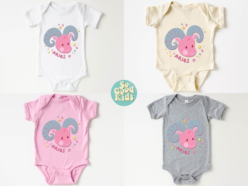 May include: Four baby onesies with different coloured backgrounds. Each onesie features a pink cartoon ram with blue horns and the word "Aries" printed below. The onesies are white, cream, pink, and grey.
