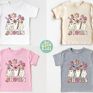 May include: Four different color t-shirts with a graphic of three ghosts wearing witch hats and the text "Let's Go Ghouls".