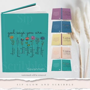 May include: A teal journal with the text "god says you are..." and a row of flowers with words like "chosen", "precious", "lovely", "capable", "beautiful", "strong", and "unique" below them. The journal has the word "Savannah" at the bottom and the text "watermark will be removed" below that. The text "SIP GLOW AND SCRIBBLE" is at the bottom of the image.