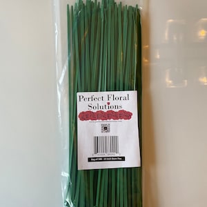 May include: A bag of 100 green 14-inch stem ties for floral arrangements. The bag is labeled "Perfect Floral Solutions" with a website address and barcode.