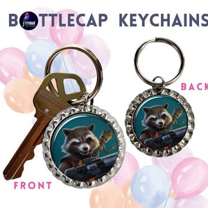May include: A silver bottle cap keychain with a blue background featuring a cartoon image of Rocket Raccoon and Groot from Guardians of the Galaxy. The back of the keychain has the same image.