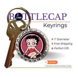 May include: Bottlecap keyring featuring a cartoon image of Betty Boop in a red dress. The keyring is made from a bottle cap with a 1-inch diameter and attached to a key and a keyring.