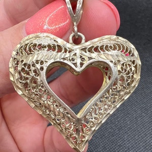 Vintage silver filigree heart pendant
