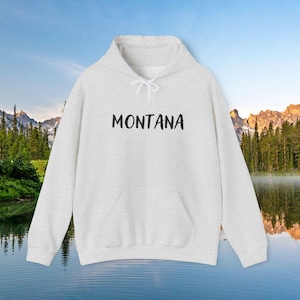 Montana adult sweatshirt hoodie mountain loving camping fishing hiking RV travel gift souvenir USA simple Montana sweatshirt.