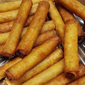BEEF lumpia (uncooked). EXTREMELY DELICIOUS!  Perfect for any event, cookout, wedding, holiday or graduations!