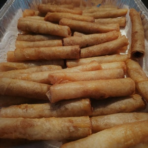 TACO lumpia (uncooked). EXTREMELY DELICIOUS!  Perfect for any event, cookout, wedding, holiday or graduations!