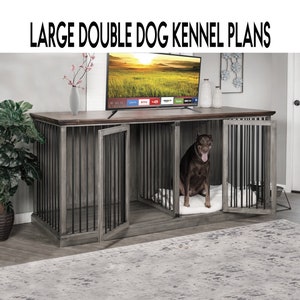 May include: A large double dog kennel with a gray wood finish and black metal bars. The kennel has two doors and is sitting on a wooden floor. A brown dog is sitting inside one of the kennels.
