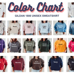 以下が含まれることがあります： Gildan 1800 ユニセックススウェットシャツの18色のカラーチャートです。色は、白、アッシュ、スポーツグレー、サンド、ライトピンク、ライトブルー、カロライナブルー、インディゴブルー、パープル、ダークヘザー、ミリタリーグリーン、フォレストグリーン、ゴールド、ヘリコニア、レッド、マルーン、ダークチョコレート、ネイビー、ブラックです。