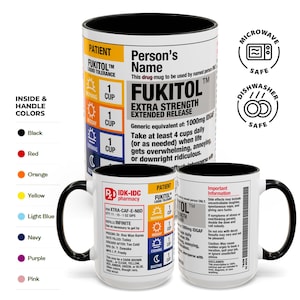 May include: White ceramic mug with a black interior and handle, featuring humorous text and a prescription label design. Includes "FUKITOL" and "EXTRA STRENGTH" text. Microwave and dishwasher safe.