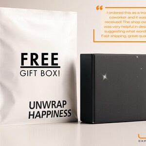 May include: A black gift box and a white bag with the text "FREE GIFT BOX!" and "UNWRAP HAPPINESS". The box has a shiny surface. The LED EXPRESSION logo is at the bottom right.