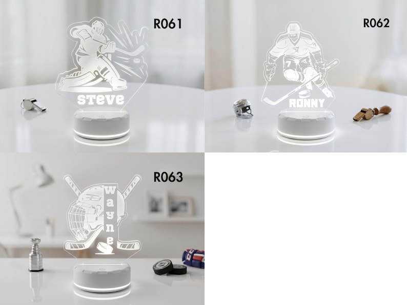 May include: Three illuminated hockey-themed night lights. One features a hockey player with the name "Steve", another with "Ronny", and the third with a helmet, crossed sticks, and the name "Wayne". Each light sits on a white base.