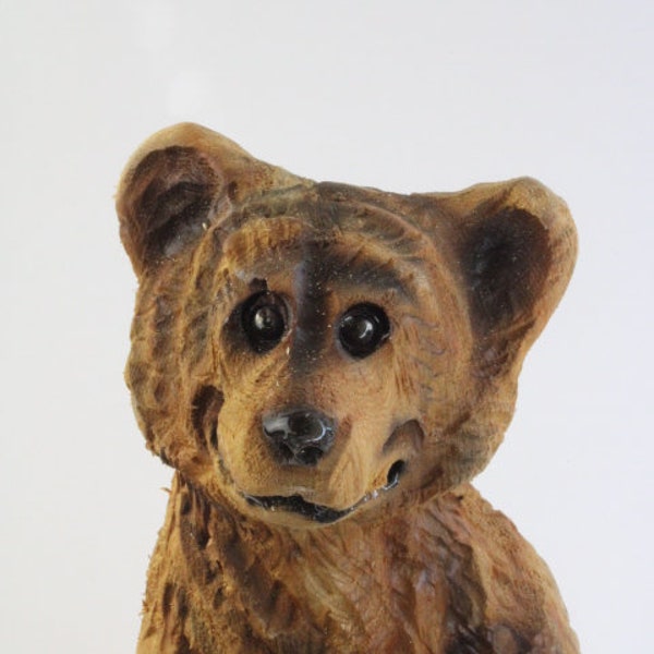 Chainsaw-Carved Adorable Bear Cub: Cute Wood Carving for Log Cabin Decor & Outdoor Campsites! Chainsaw Carving, hand-carved wooden bear.