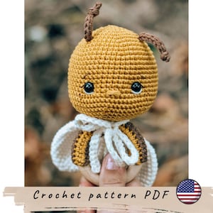 Sonaglio a forma di ape per neonati, schema all'uncinetto. Simpatico sonaglio a forma di ape all'uncinetto. Amigurumi per neonati. Schema all'uncinetto in inglese.