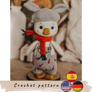 Osterente Häkelanleitung. Witzige Ente im Hasenoutfit, mit Häkelanleitung. DIY Osterspielzeug. Amigurumi Entenmuster.