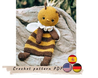 Modello per copertina a forma di ape. Peluche all'uncinetto.