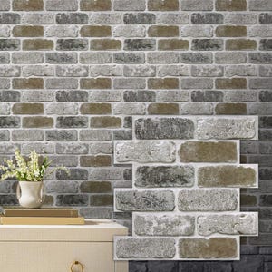 May include: A rectangular wall sticker featuring a realistic pattern of weathered gray and brown bricks with white mortar lines. The design mimics a rustic masonry surface with textured brick details, arranged in a standard running bond pattern.