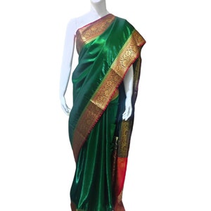 Dark green and Dark red satin silk saree with banarasi border and red unstiched blouse and green cotton peticoat Bollywood modern festivals