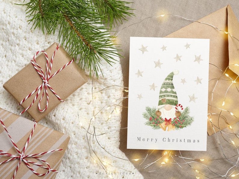 Adorable watercolor Christmas card featuring a whimsical gnome, set against a backdrop of colorful holiday decorations and stars