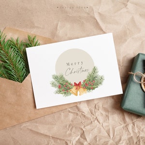 Festive Christmas card with a cute watercolor illustration, complemented by seasonal elements like holly and bells
