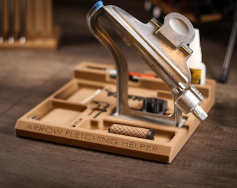 Ayuda para emplumar flechas con plantilla Bitzenburger: emplumar flechas con precisión es fácil