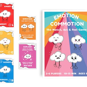 May include: A colorful board game titled "Emotion Commotion" with cards featuring cartoon cloud characters expressing different emotions. The game includes cards labeled "Anger," "Joy," and "Sadness," and the game is for 2-6 players.