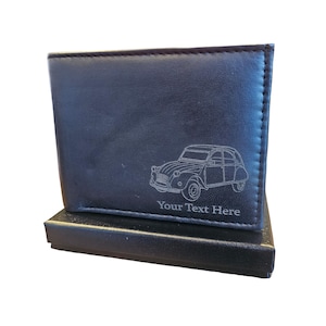 May include: Black leather wallet with an engraved image of a vintage car and the text "Your Text Here".