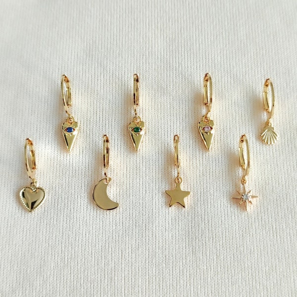 Mono boucles - boucles d'oreilles - mini créoles en acier inoxydable doré - unité - dépareillé - étoile, lune, coquillage, oeil, coeur