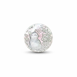 May include: A round, mother-of-pearl pendant featuring a detailed illustration of a cat gazing to the side. The design includes flowers and butterflies, with a soft pink background. The pendant has a pearlescent sheen.