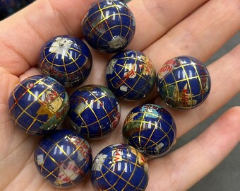 宝石地球儀、ラピスラズリなどの宝石で作られ、14カラットのイエロー 